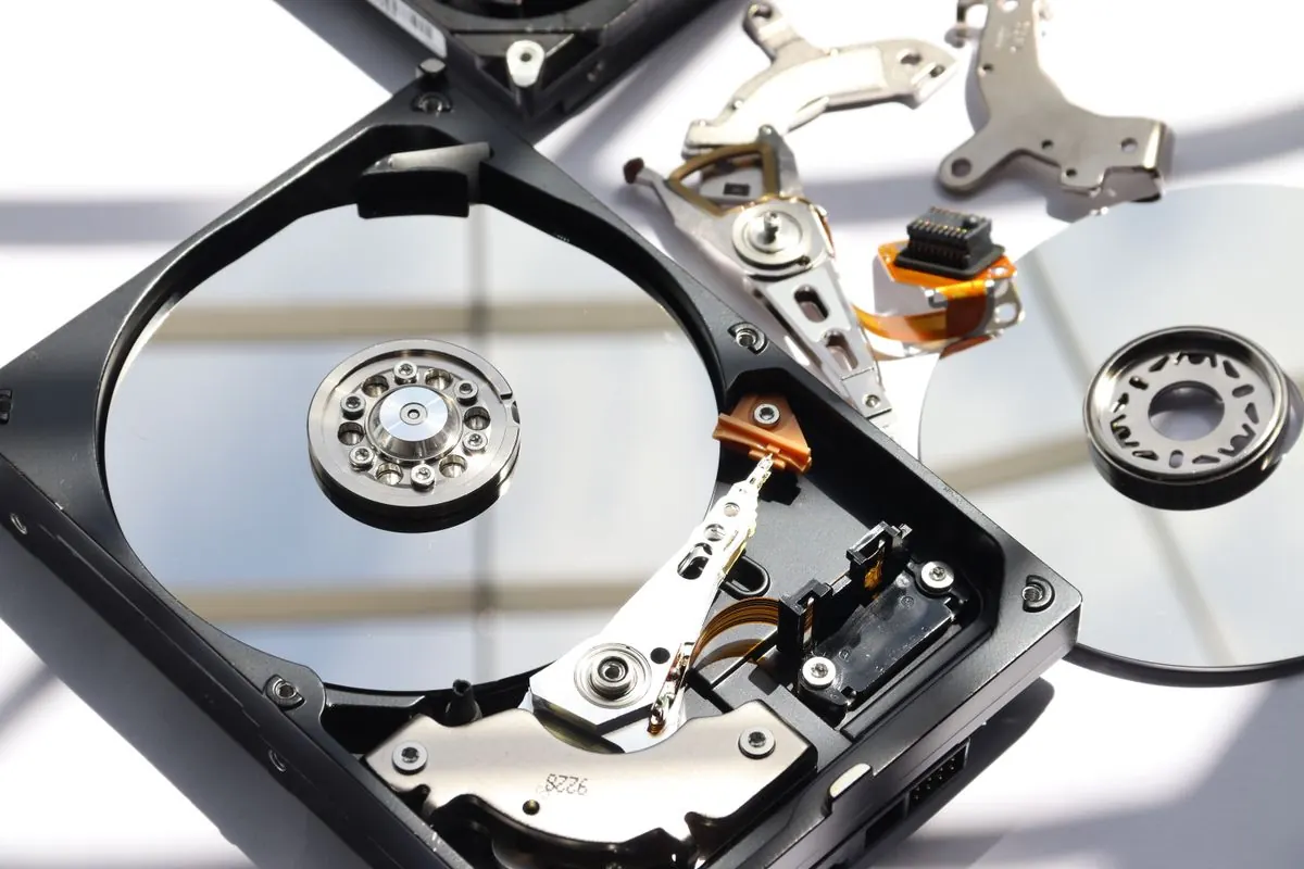 An opened hard drive during data recovery